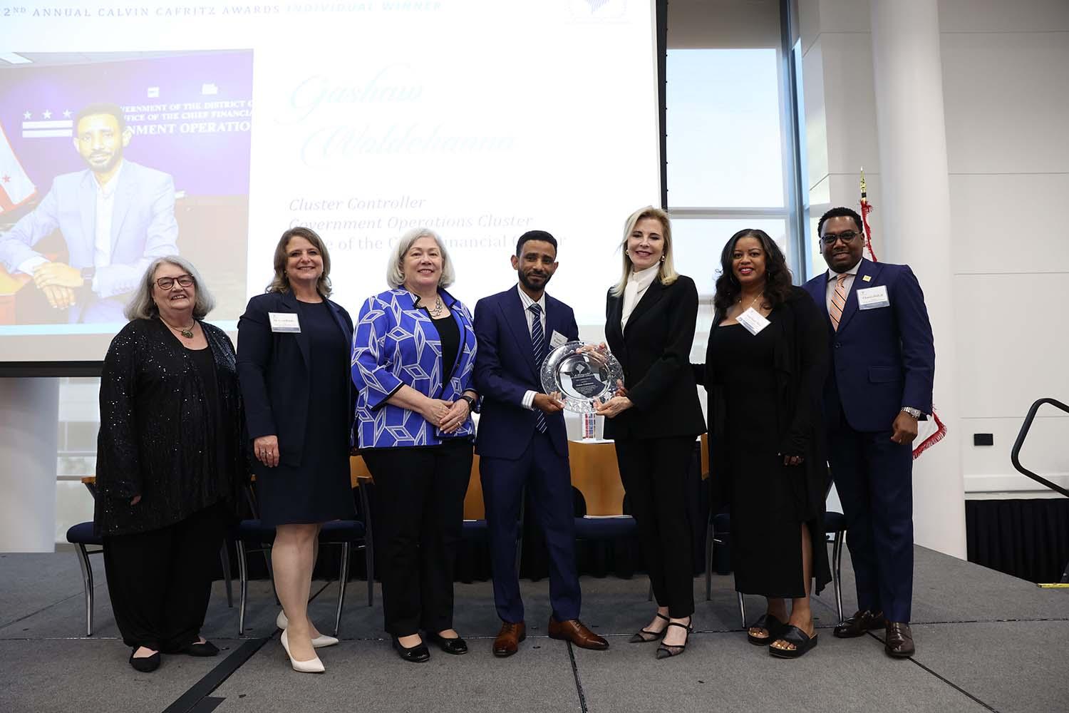 From left to right: Natalie K. Houghtby-Haddon, Liesl Riddle, Ellen M. Granberg, Gashaw Woldehanna, Jane Cafritz, Angelique Hayes Rice, and Charles Hall Jr. celebrate public service excellence at the 22nd Annual Cafritz Awards Gala.